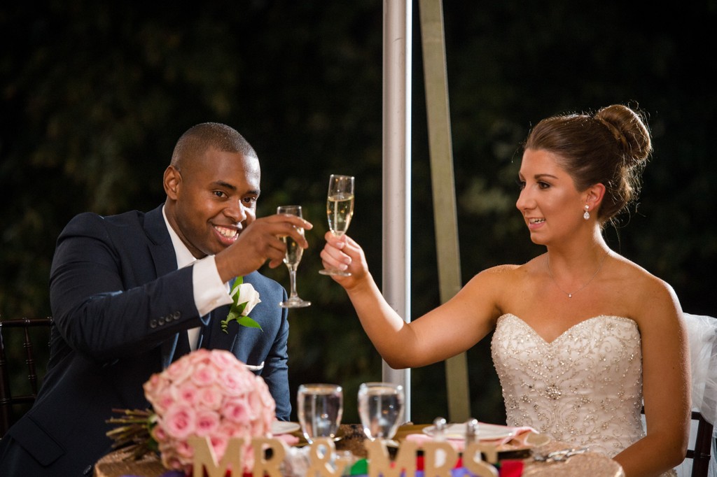 Bride and groom champagne toast Blithewold Mansion wedding