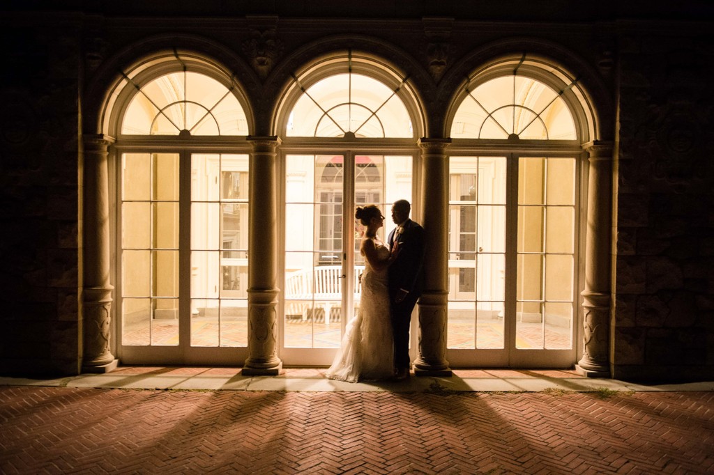 Dramatic night shot Blithewold Mansion wedding exit