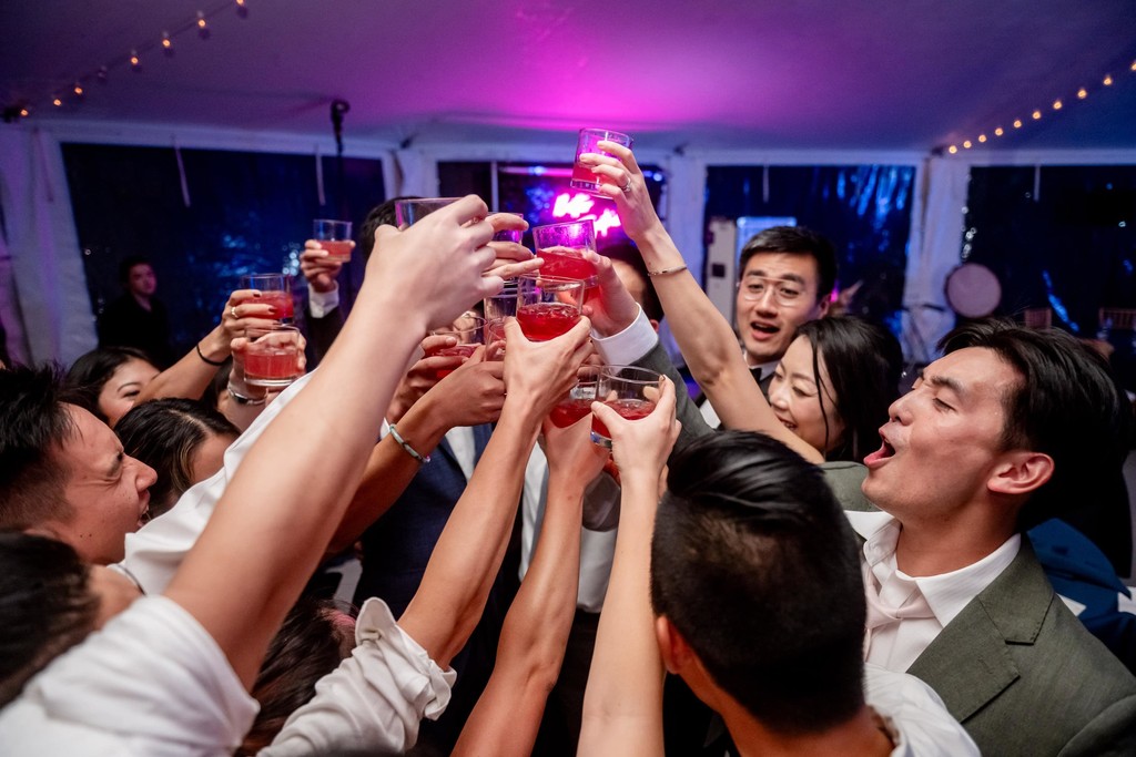 cheers on the dance floor at decordova museum weddings