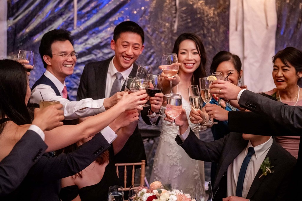 Guests toasting at deCordova Museum weddings reception