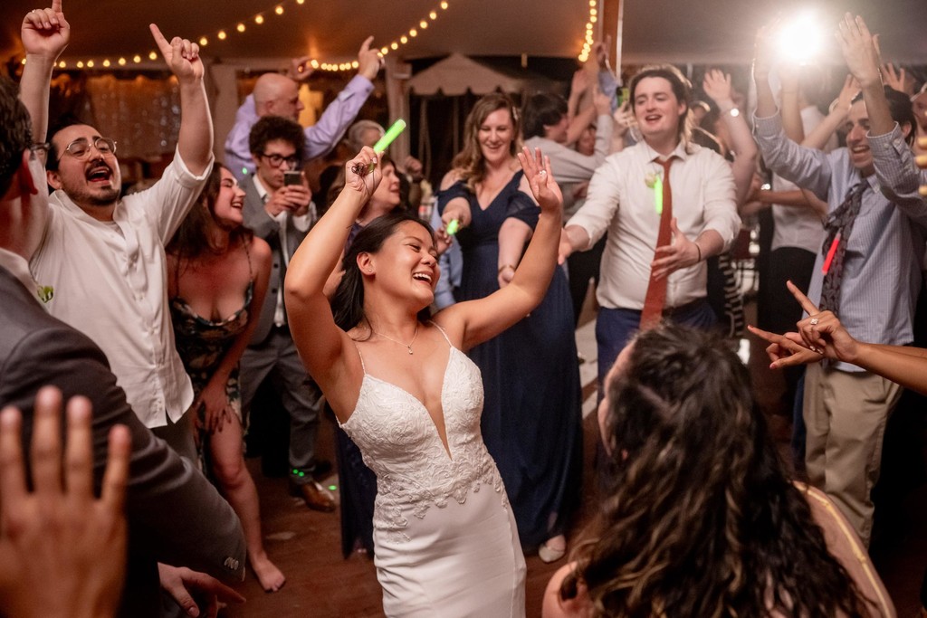 Bride rocking out at her deCordova Museum wedding reception