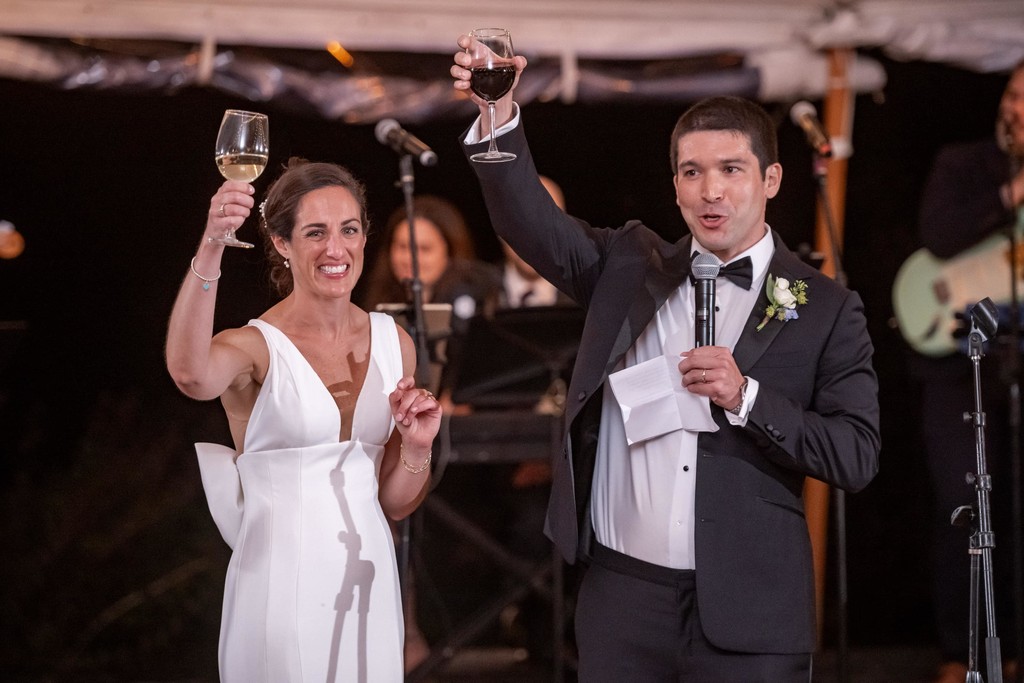 Bride and groom giving a toast at deCordova Museum weddings reception