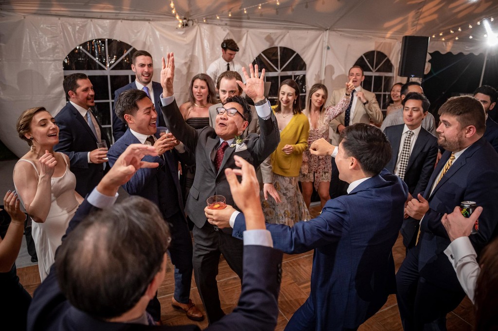 Wedding guests having fun on the dance floor at deCordova Museum weddings