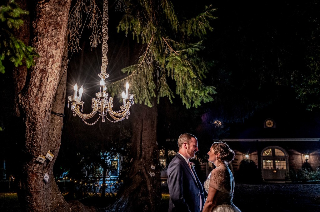 Dancing under the chandelier at an Elm Bank wedding reception