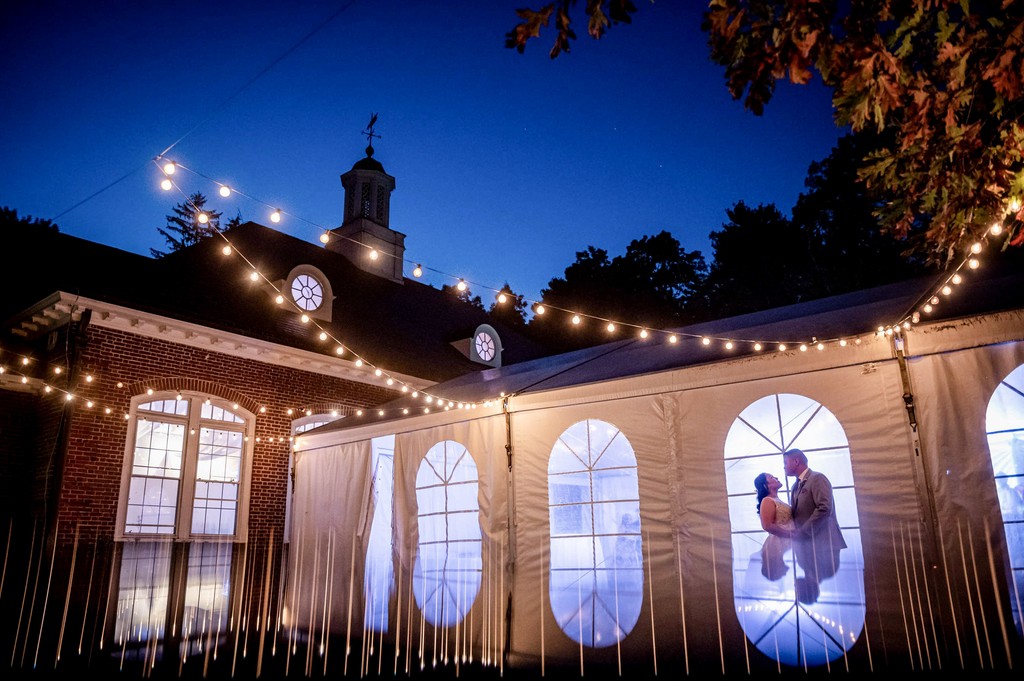 Nighttime scene with illuminated pavilion at Elm Bank weddings