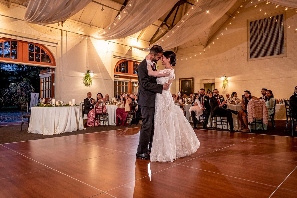 Bride and groom sharing first dance at Elm Bank wedding reception