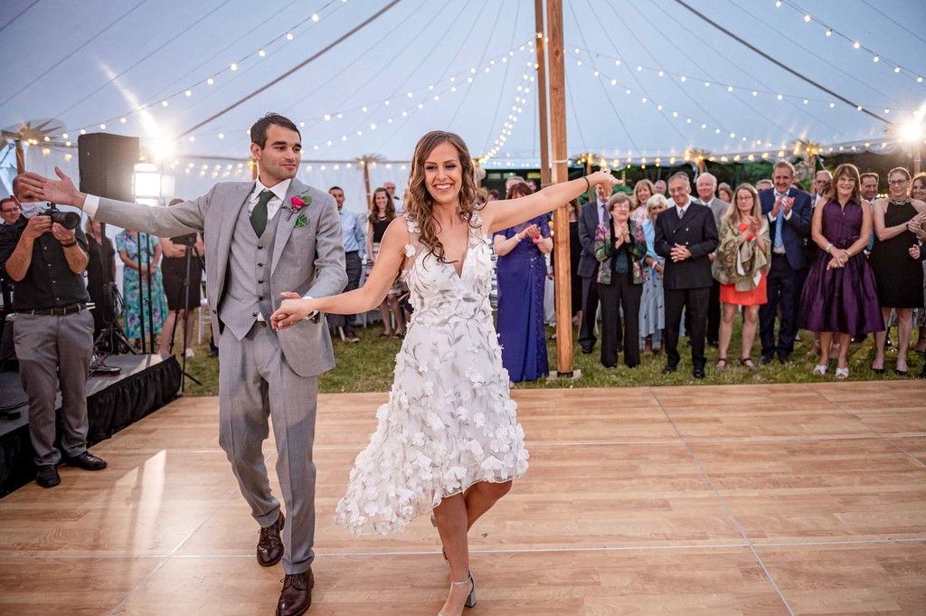 Bride and groom dancing under the tent at Elm Bank weddings