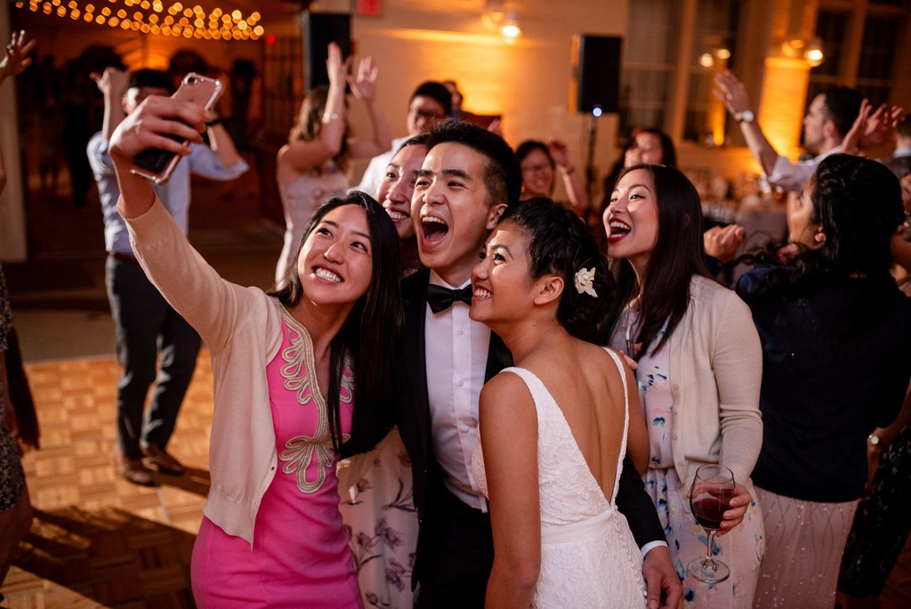 Wedding guests selfie on the dance floor at Elm Bank weddings