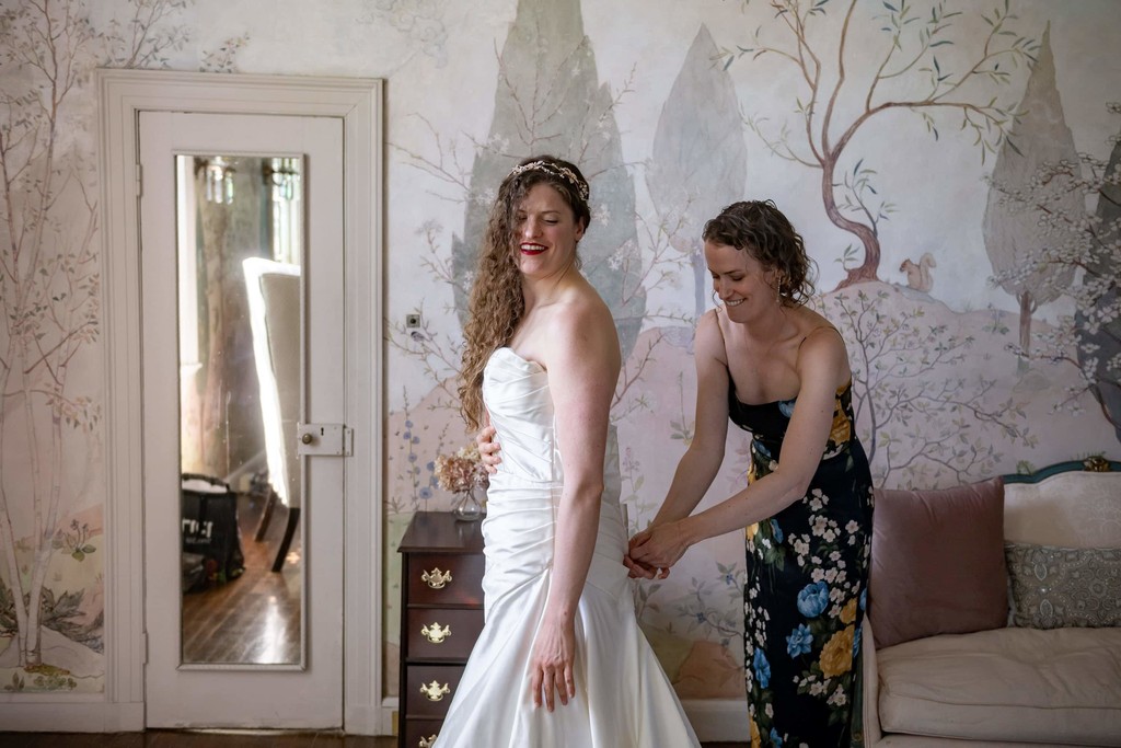 Bridal suite candid at Long Hill wedding in Beverly MA