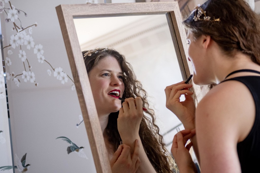 Bride getting final touch-ups at Long Hill Beverly wedding