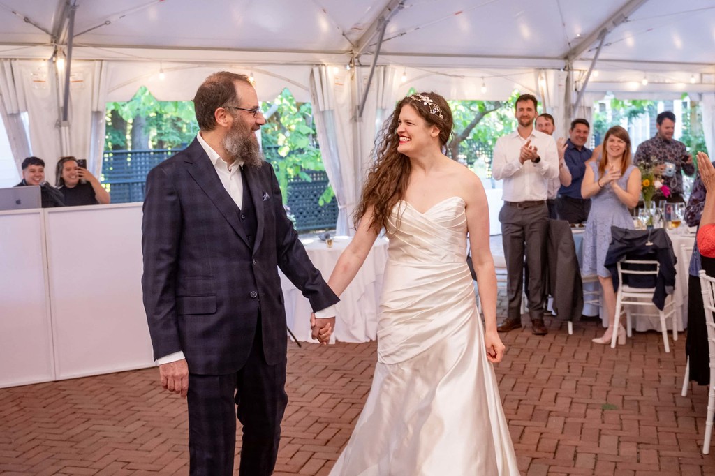 Just married couple entering reception at Long Hill in Beverly