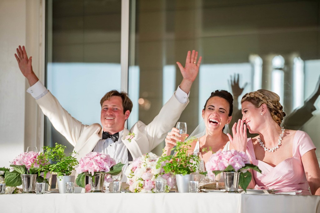 Wedding reception toast laughter and whispers 