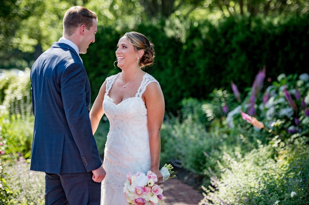 Groom sees bride for the first look at a Wequassett wedding
