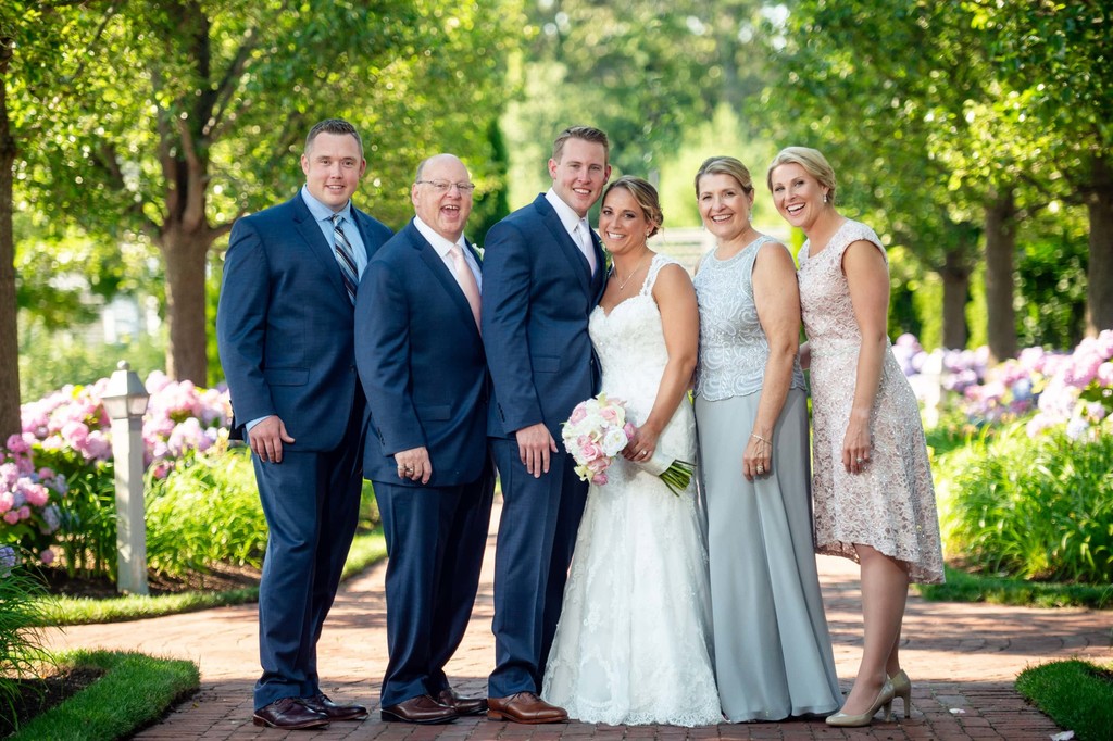 Group photo in gardens at Wequassett weddings