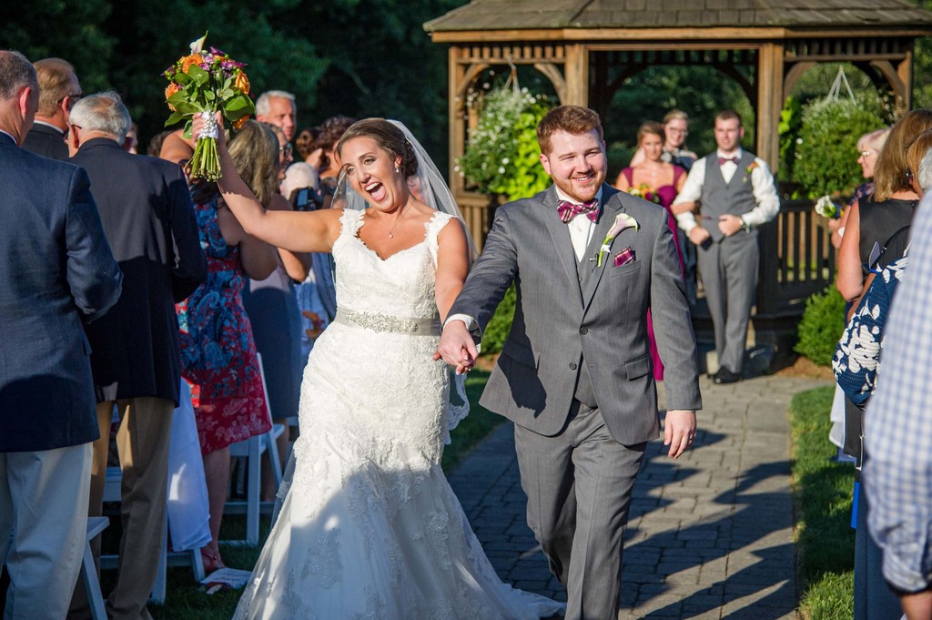 Joyful wedding ceremony at Fern Hill Barn wedding