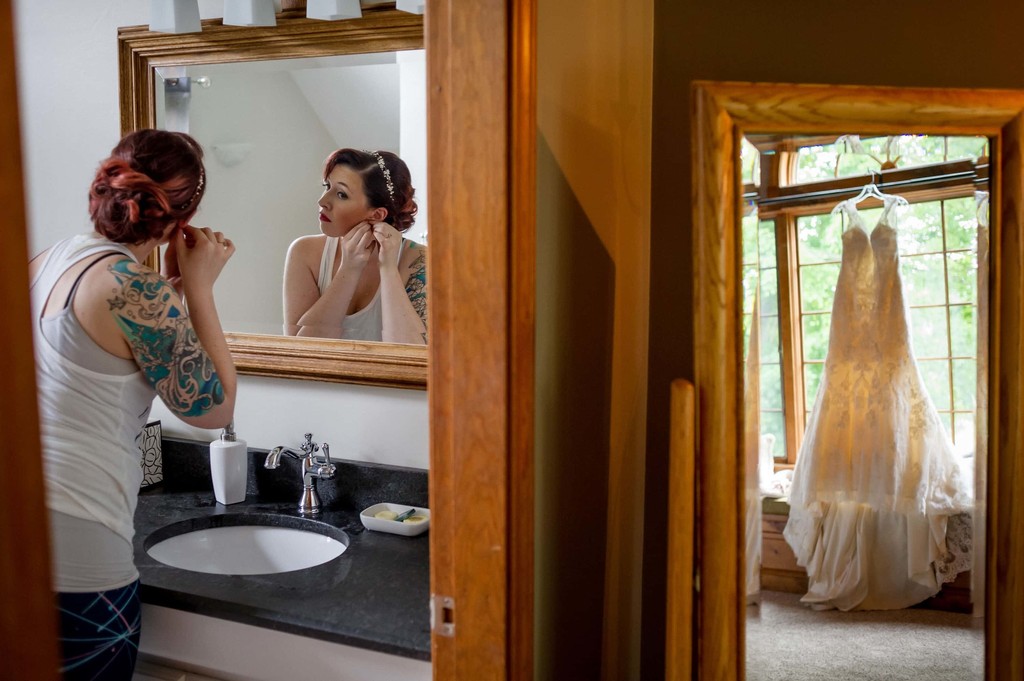 Bridal prep moment inside Fern Hill Barn