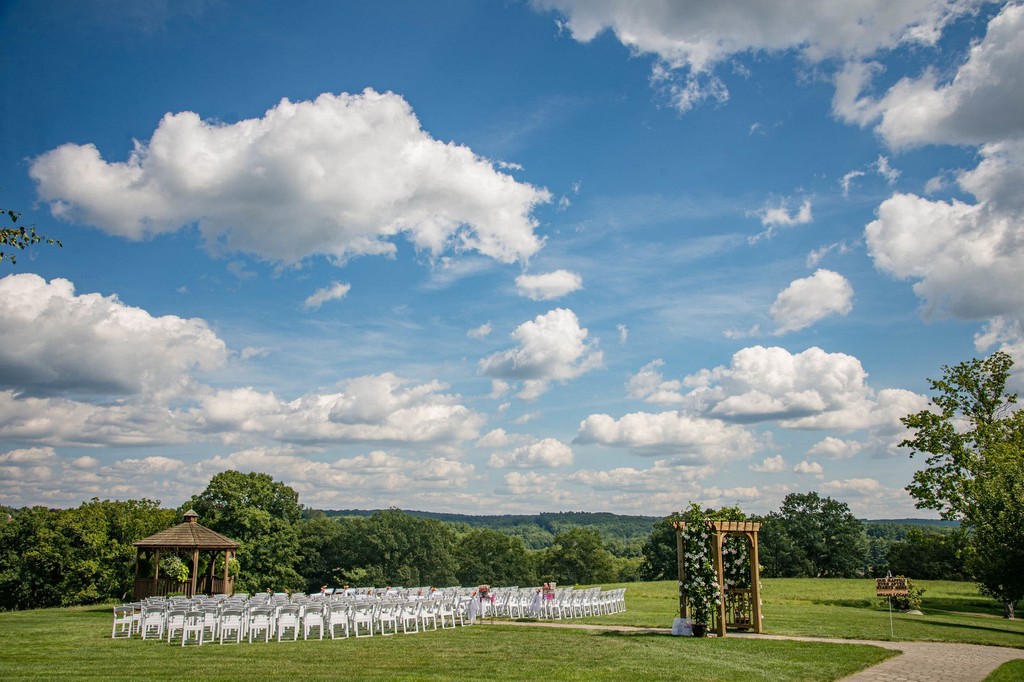Fern Hill Barn outdoor ceremony with mountain views