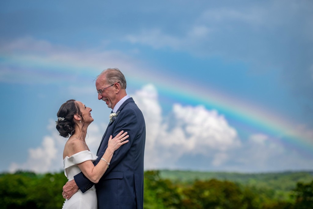 Rainbow wedding photo at Fern Hill Barn venue