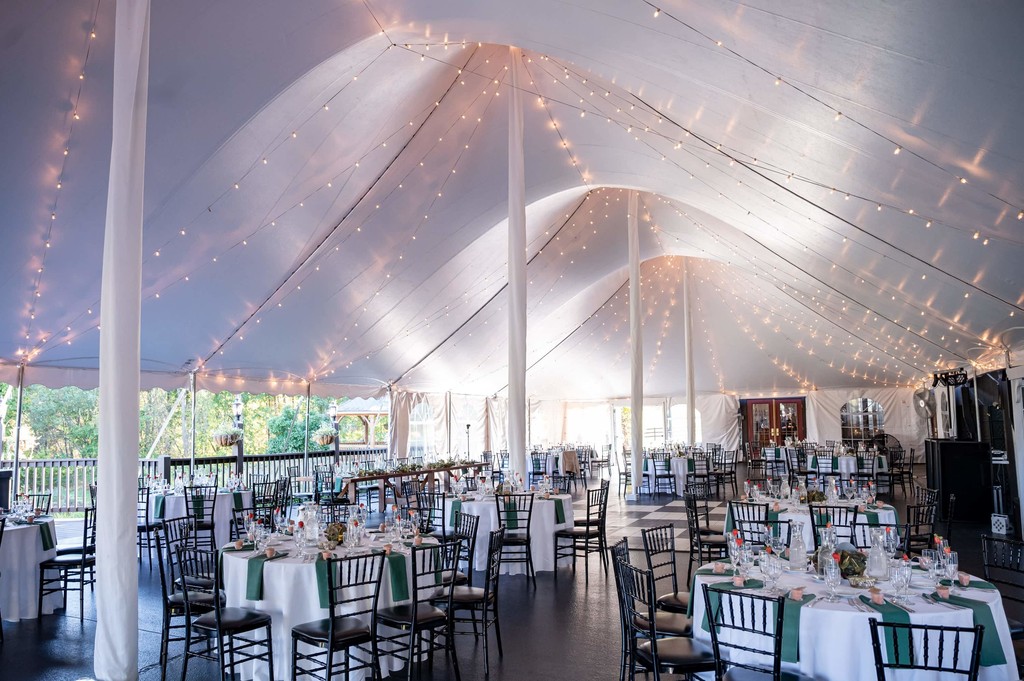 Elegant tented reception inside Fern Hill Barn grounds