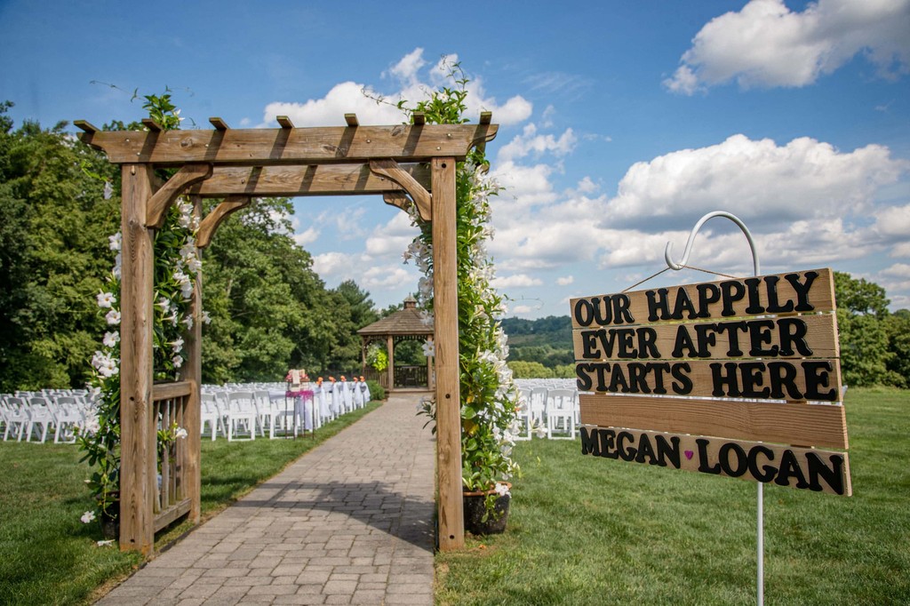 Custom ceremony arch at Fern Hill Barn wedding