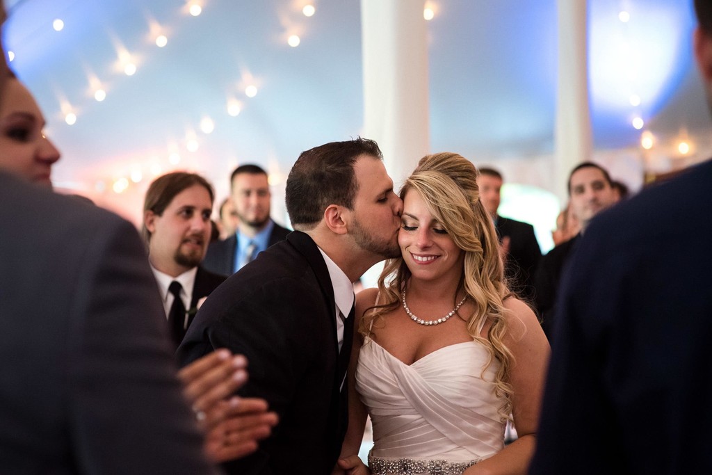 Sweet moment between groom and bride on the dancefloor at Fern Hill Barn