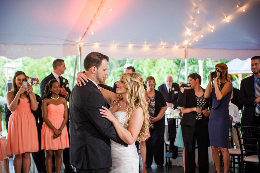 Bride and groom laughing during dance at Fern Hill Barn