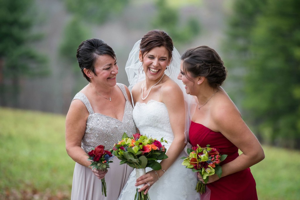 Candid family portraits at Fern Hill Barn wedding