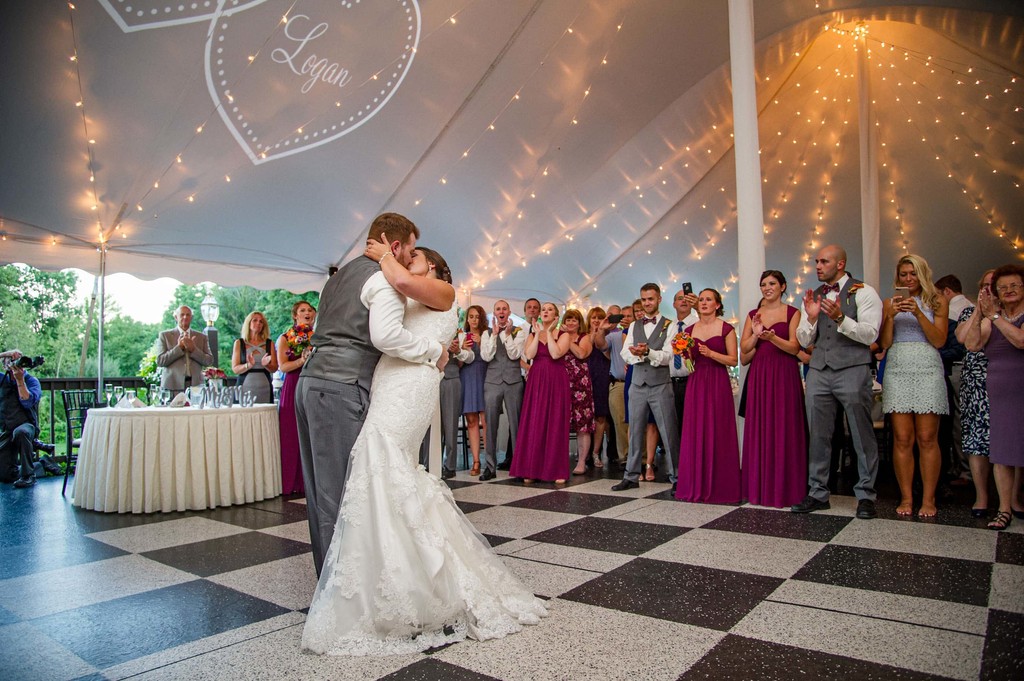 Reception celebration at Fern Hill Barn with dance floor lights