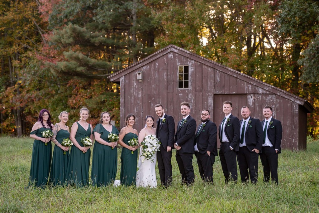 Wedding party outside rustic barn – Fern Hill Barn
