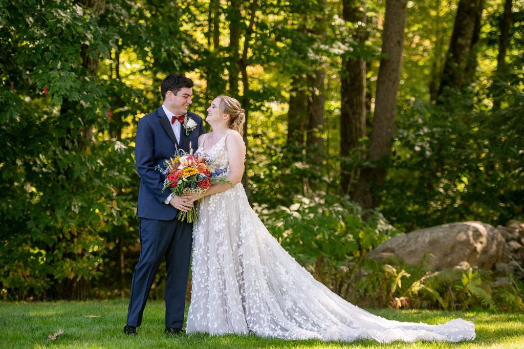 Bride and groom in the woods at Fern Hill Barn