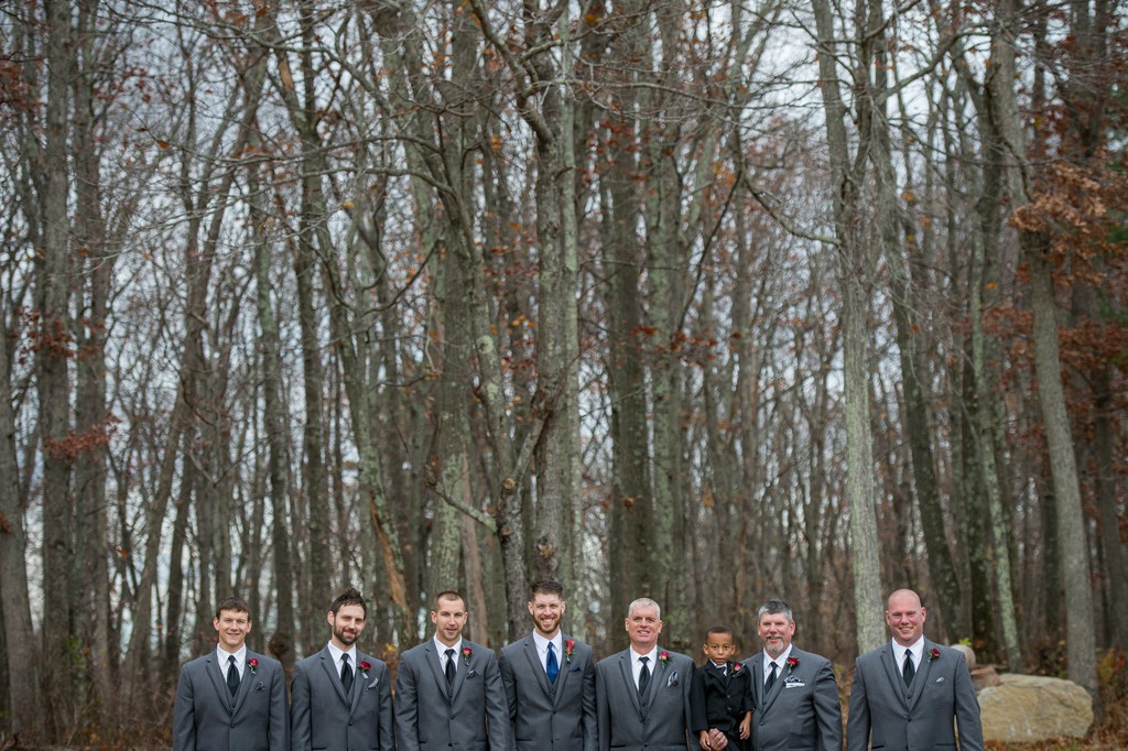 Groomsmen lined up in the woods – Fern Hill Barn wedding