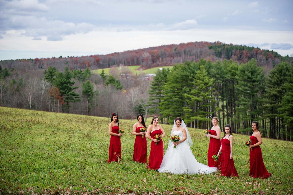 Bride and bridesmaids in autumn field – Fern Hill Barn