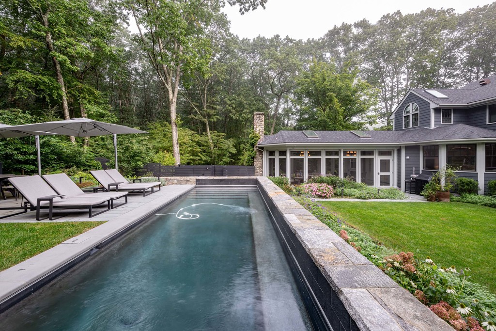 Luxury backyard pool and outdoor living space