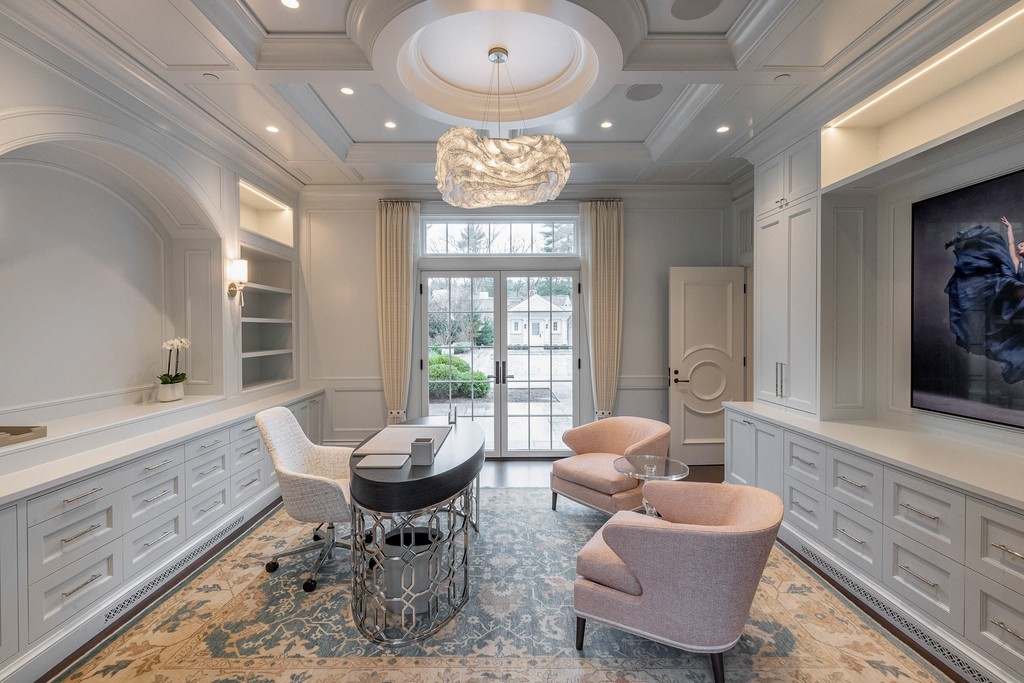 Formal office space with coffered ceiling and built-ins