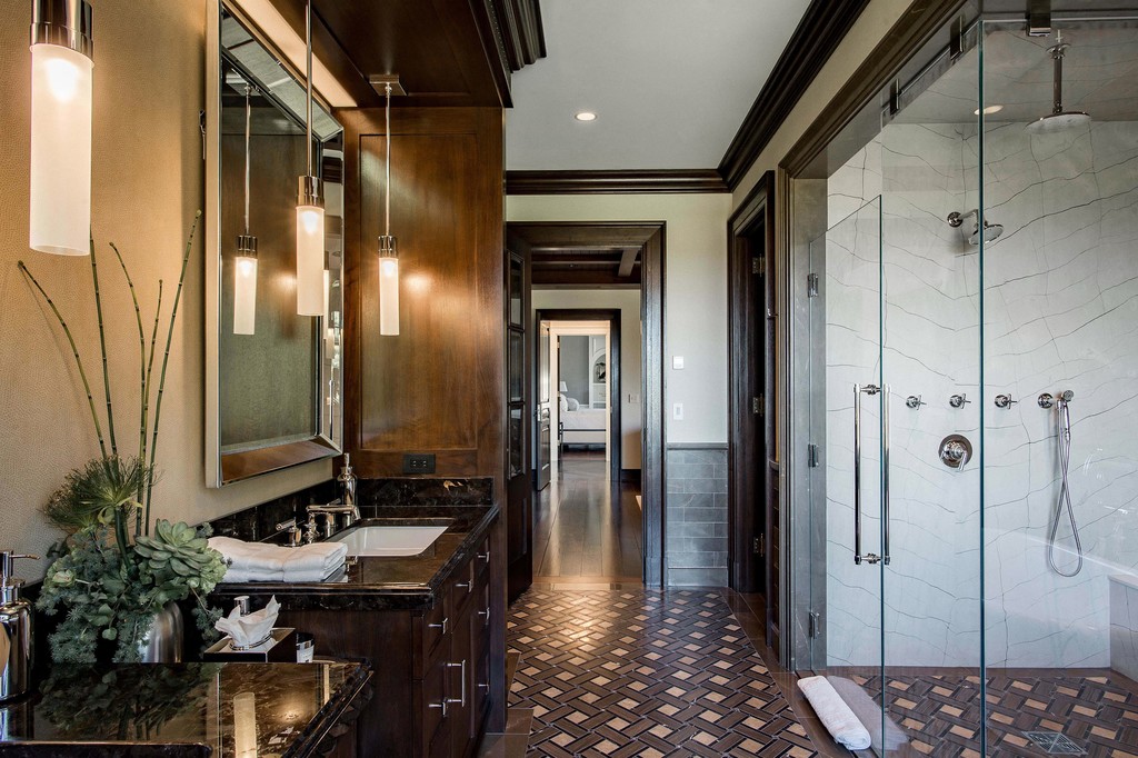 Elegant bathroom with moody lighting and warm accents