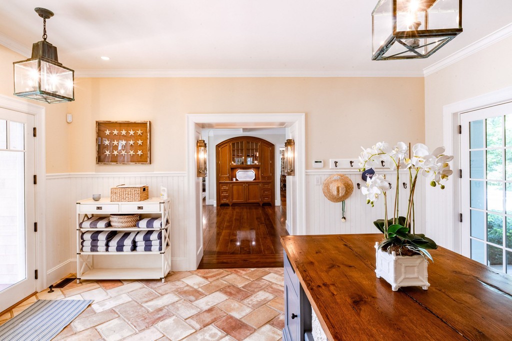 Luxury entryway with a modern coastal vibe