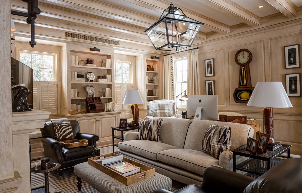 Rustic living room with exposed beams and leather seating