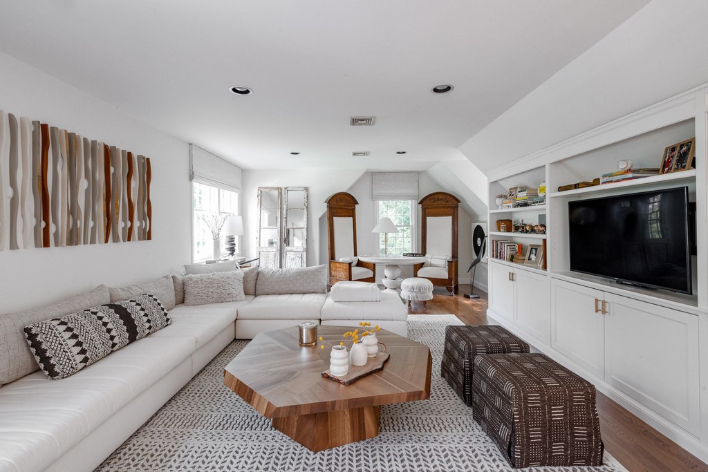 Neutral toned living room with wood accents and soft textures