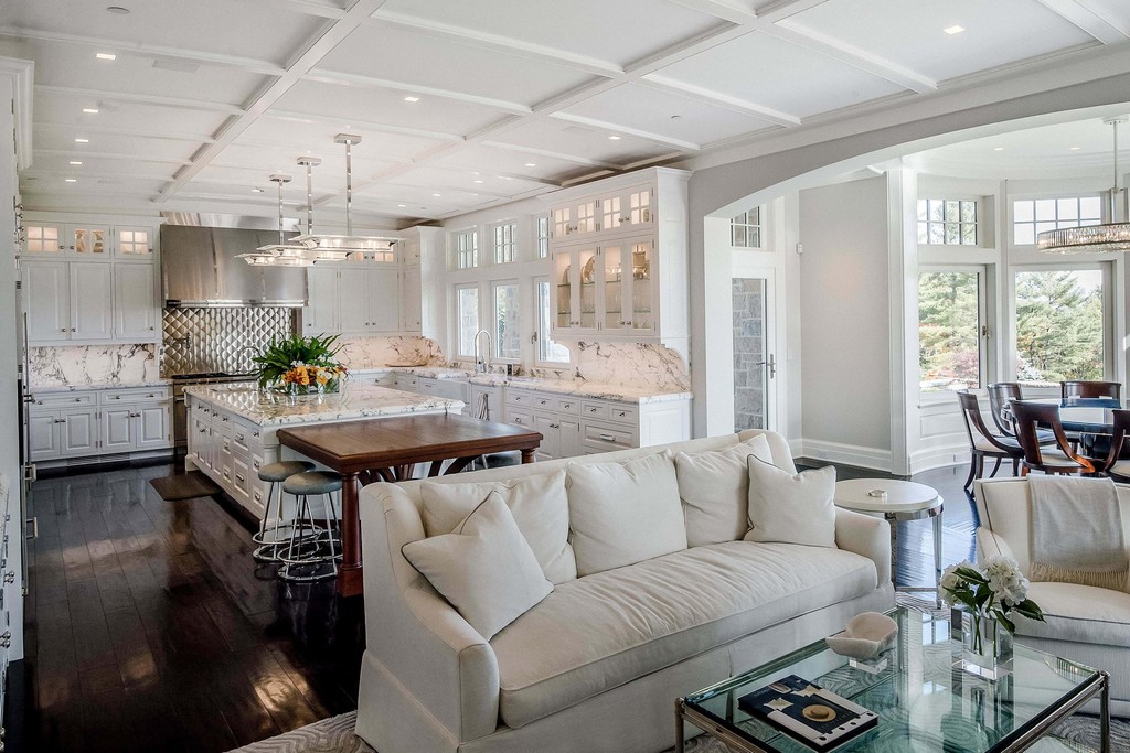 White kitchen with breakfast nook and natural light
