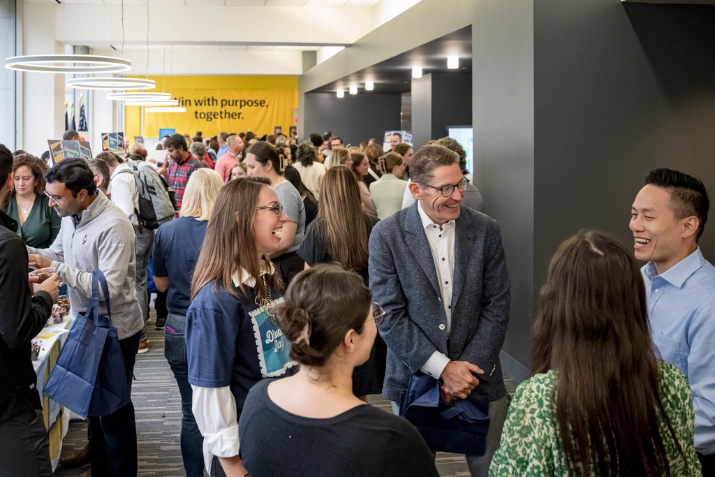Networking attendees photographed at Liberty Mutual event