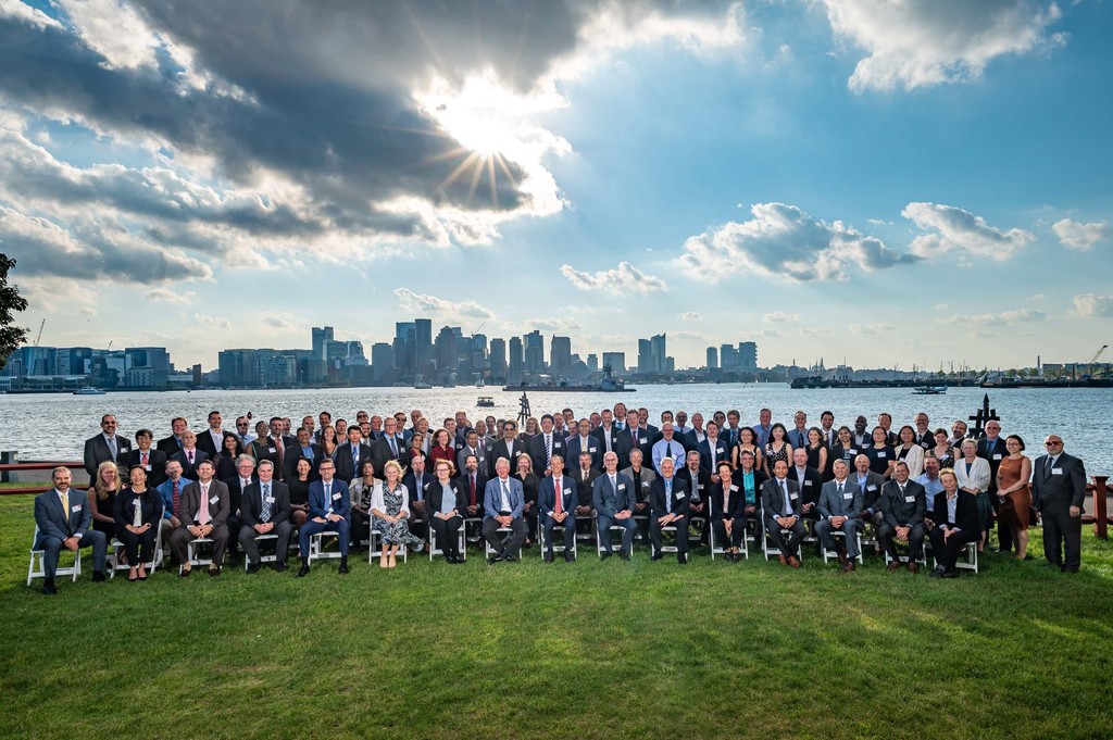 Massive group portrait with Boston skyline backdrop