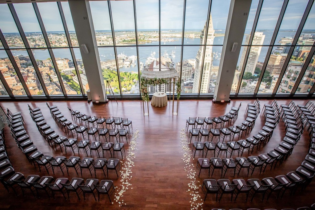 Wide-angle of State Room ceremony setup daytime city view