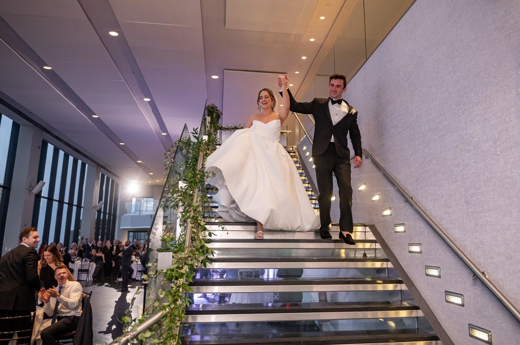 Grand staircase wedding reception entrance moment