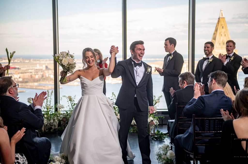 Joyful post-ceremony moment with bride and groom
