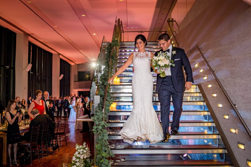 Grand staircase entrance during Boston wedding reception