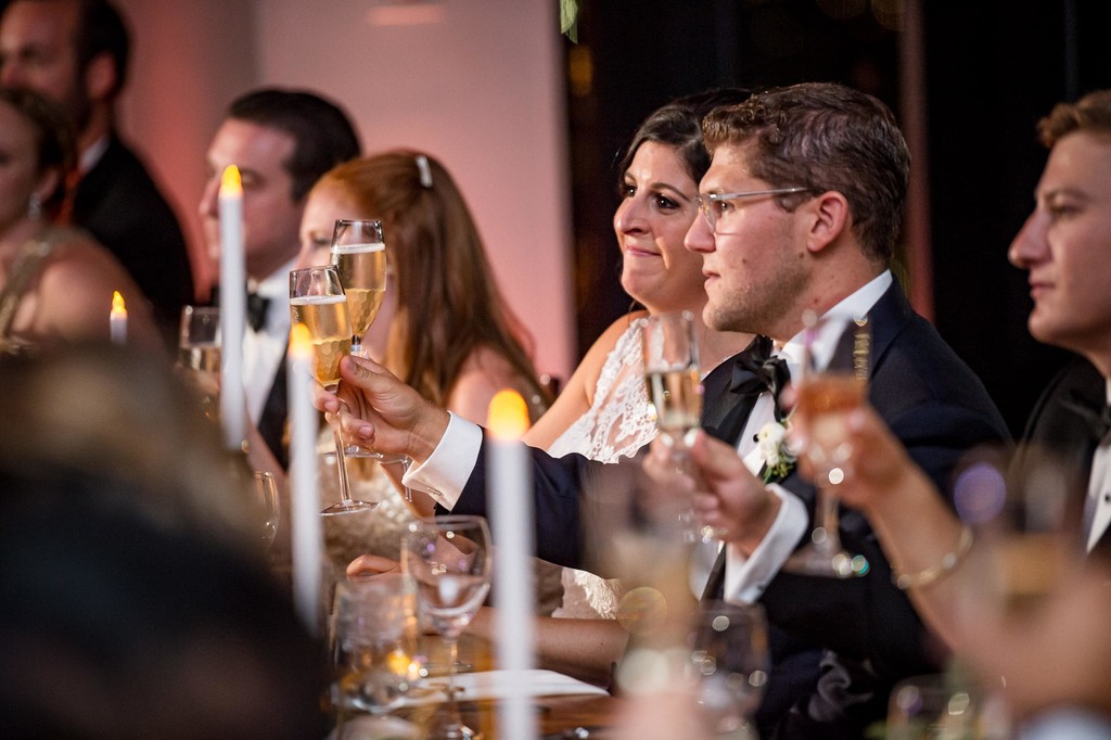 Wedding reception emotional moment during the toasts