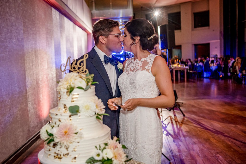 Cutting the wedding cake during State Room reception