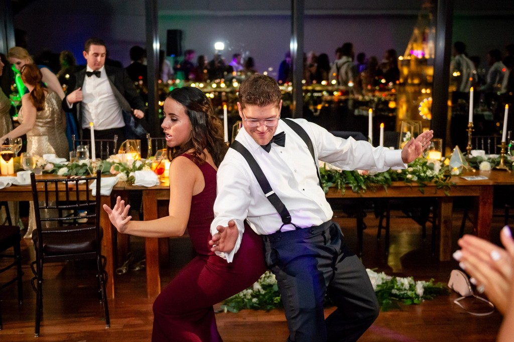 Groom and friend tearing up the dancefloor