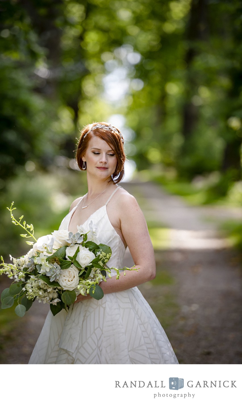 Bride holding bouquet Blithewold Mansion wedding gardens