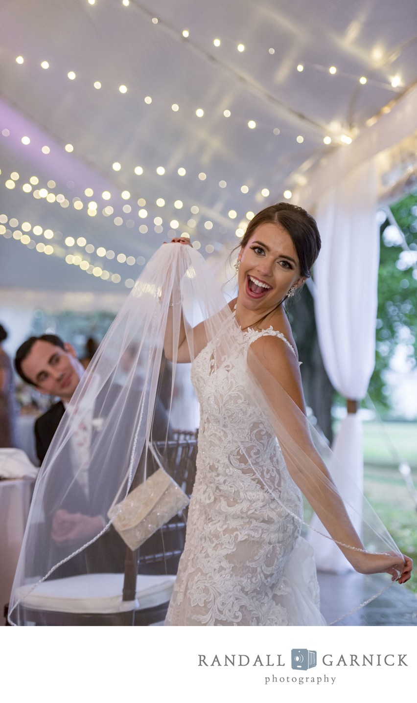 Bride twirling veil Blithewold Mansion wedding